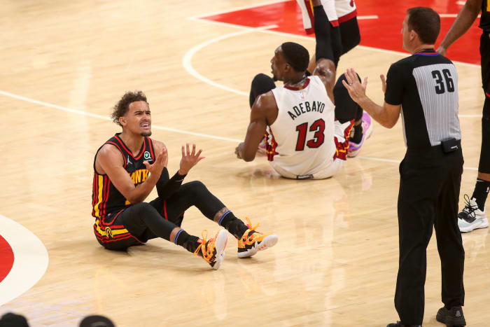 Atlanta Hawks guard Trae Young reacts to a foul during a game against Miami Heat.
